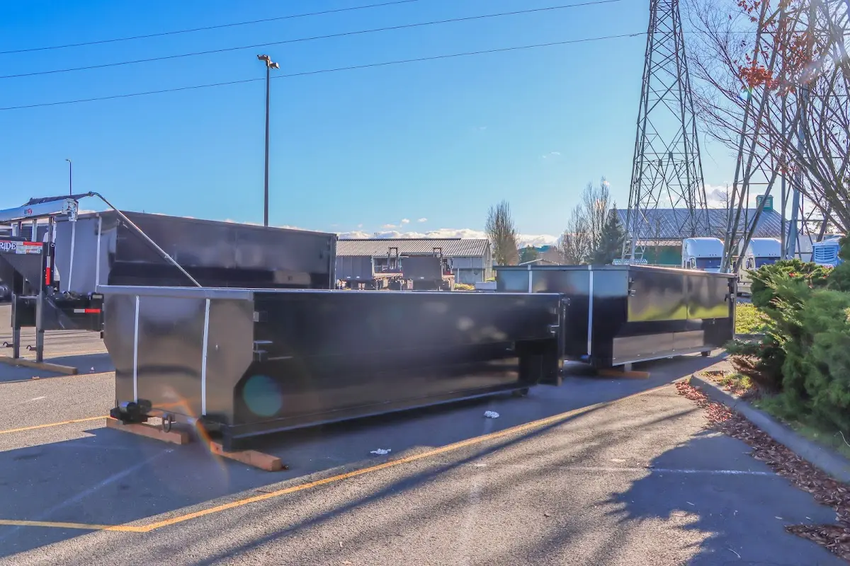 Roll-off dumpster ready for waste disposal at job site for 15 Yard Dumpster Rental in West View